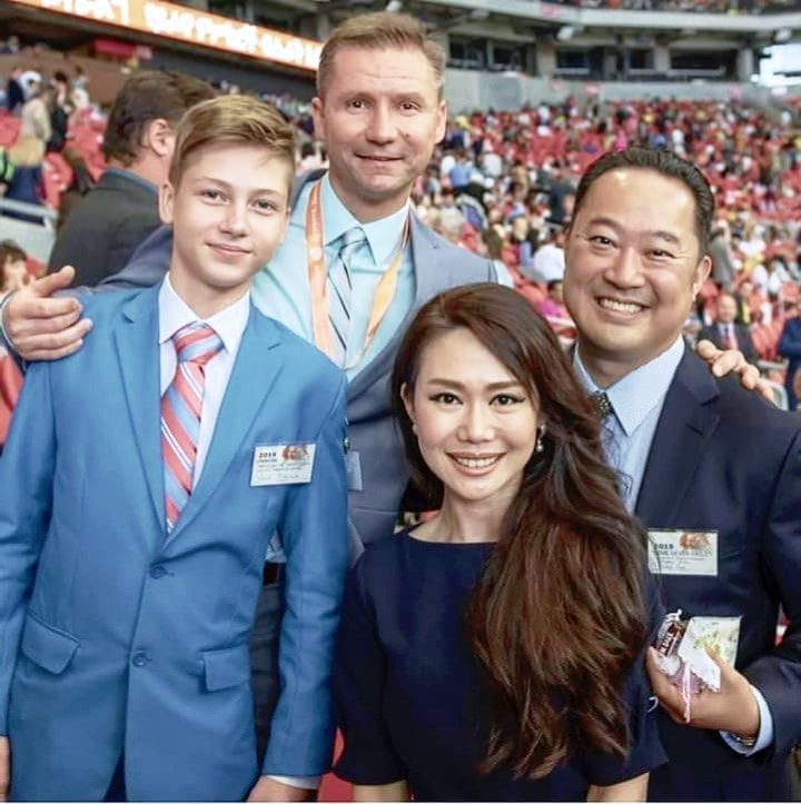 Congregation activity captured in a candid group photo.